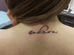 Татуировка - надпись на шее Believe